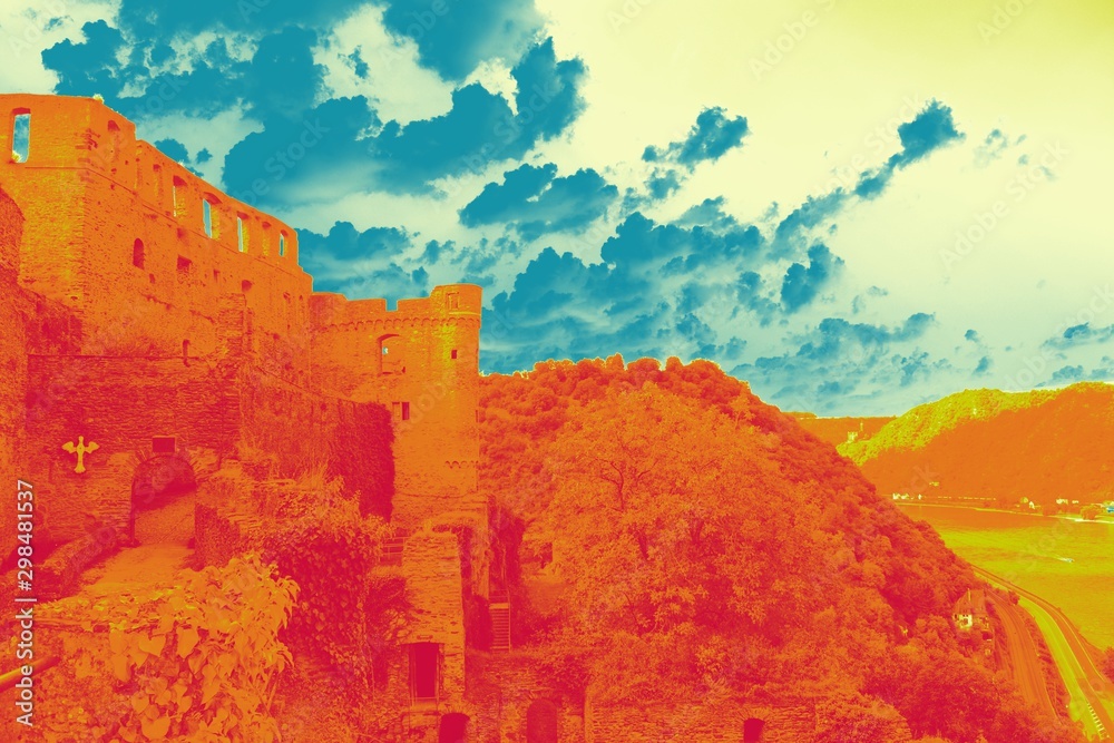 Gradient filter on castle ruins, onto of a hill with river below. Stock ...