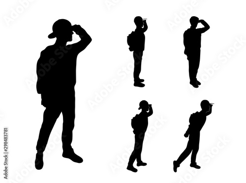 Vector illustration. Tourist silhouettes. The guy looks away. A man with a backpack and binoculars watches by nature. Elements for design invitations, gift cards, flyers and brochures. Male silhouette