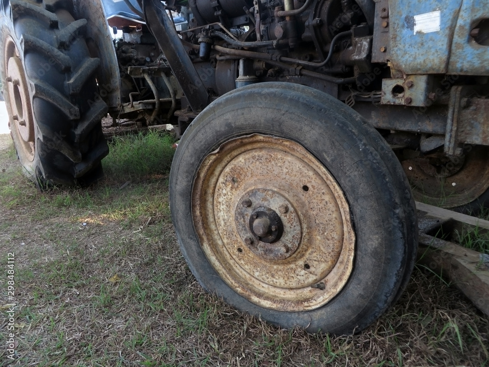 Flat tire can not continue., wheel of a tractor