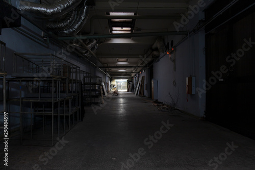  Long dark corridor in an old industrial building © vadim_fl