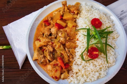 Chicken pieces with stewed rice.