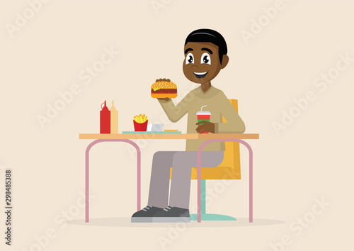 African man eating fast food.