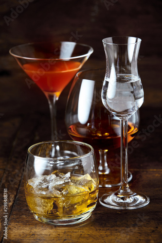 Whisky, cognac, martini and liqueur on a counter
