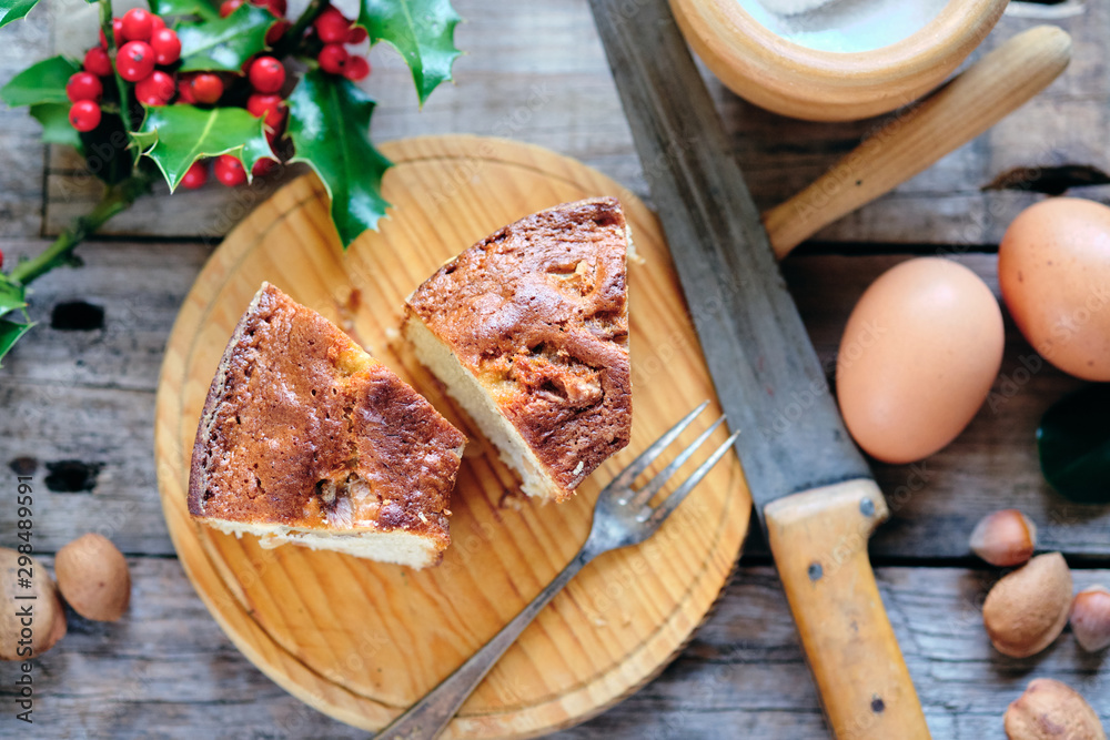 Almond sponge cake with rustic background