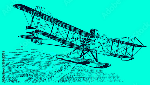 Historical single-engine biplane floatplane flying over an uninhabited river landscape on a blue-green background. Editable in layers photo