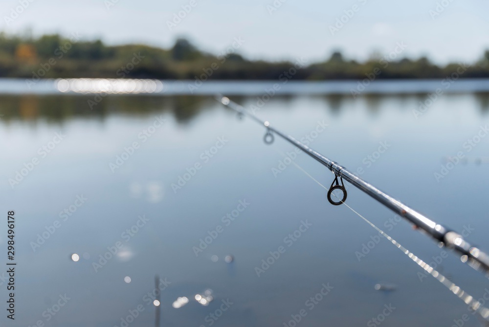 feeder fishing rod isolated on lake. 
