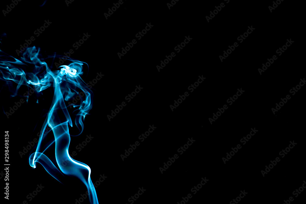 Smoke on a black background. Abstraction.