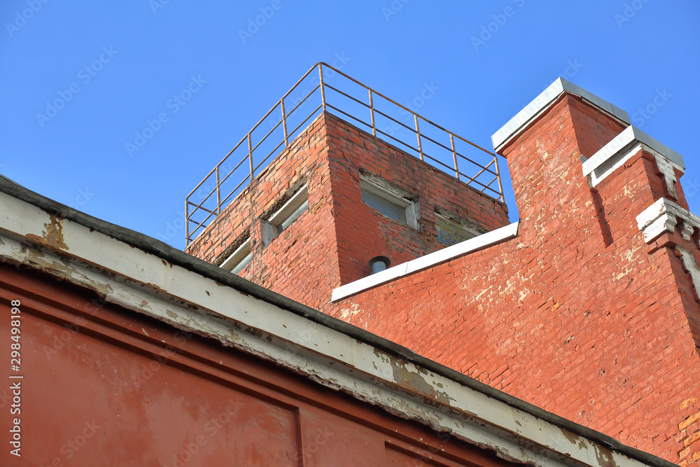 A dilapidated brick building of an old factory of the last century