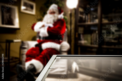 Desk of free space and santa claus home interior 