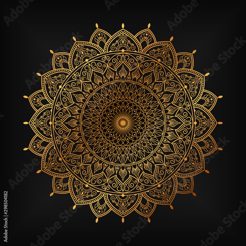 luxury ornamental mandala design background in gold color