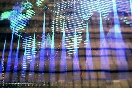 Financial chart hologram with globe and abstract background. Double exposure. Concept of market analysis