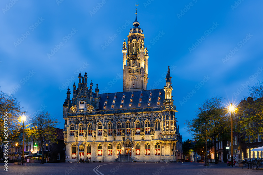 Illuminated townhall in medieval city Middelburg, The Netherlands