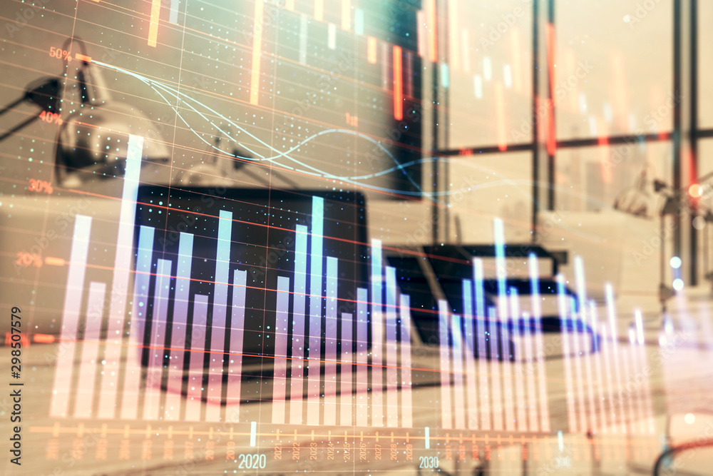 Stock market chart and desktop office computer background. Multi exposure. Concept of financial analysis. Stock market chart and desktop office computer background. Multi exposure. Concept of financial analysis.