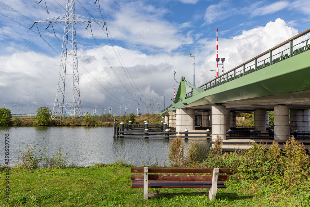 Dutch landscape with steel bridge over river Vecht