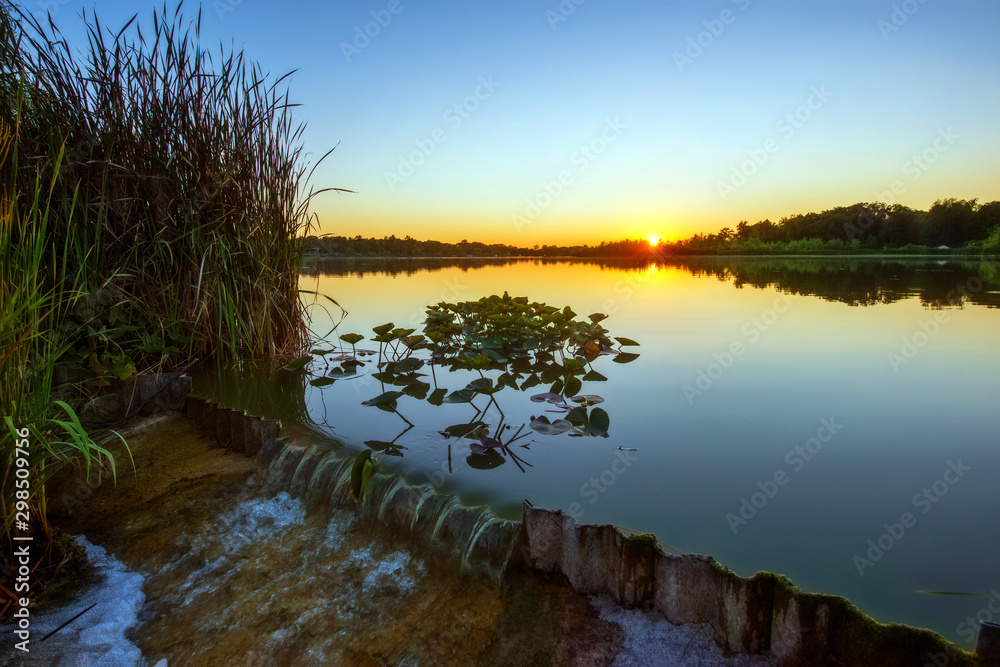Sunset over Calm Water at Spillway