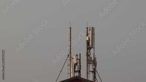 Tilt Down Revealing One Telecommunication Tower. photo