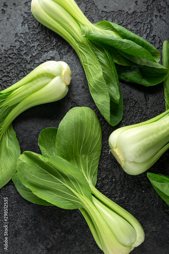 Pak Choi Chinese Cabbage on rustic black background