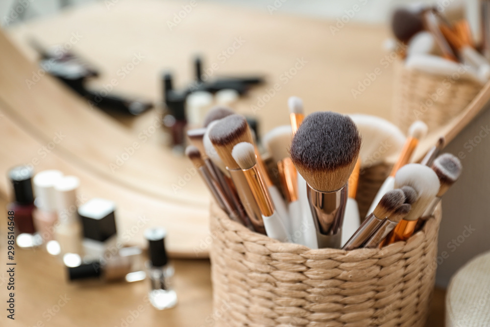 Brushes on dressing table in makeup room - obrazy, fototapety, plakaty 
