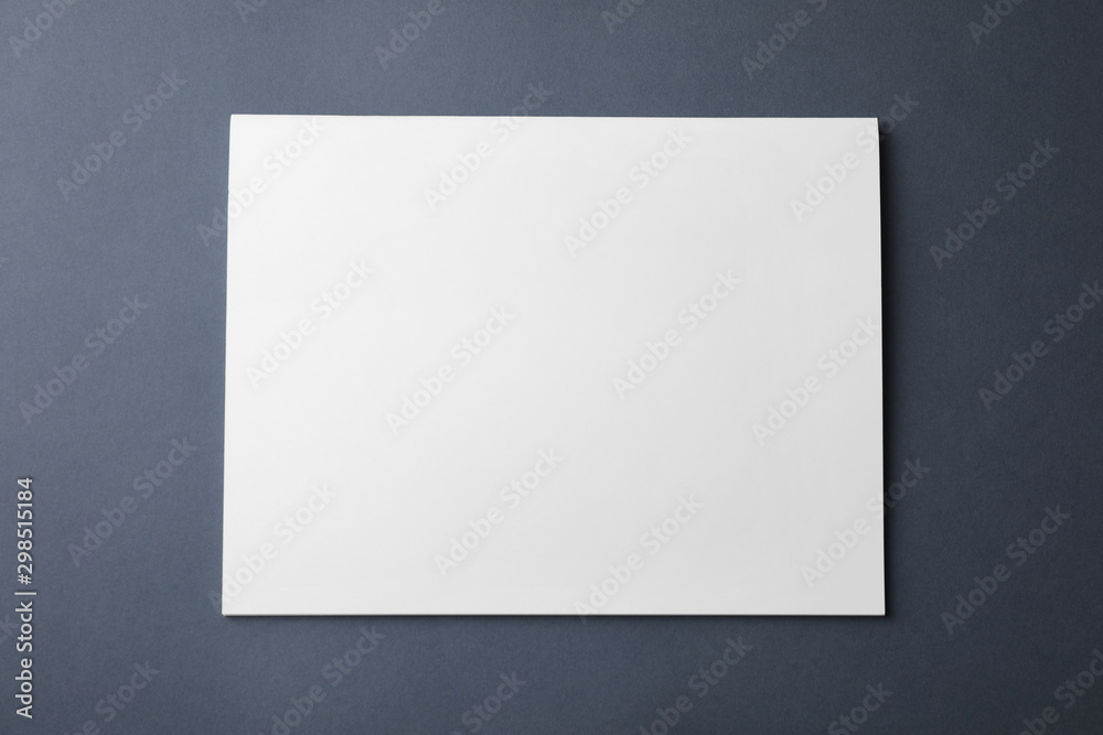 Blank book on dark grey background, top view. Mock up for design Blank book on dark grey background, top view. Mock up for design