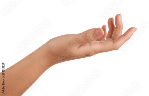 Woman holding something on white background, closeup of hand