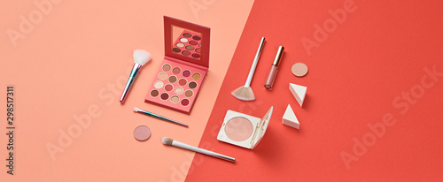 Cosmetic makeup accessories layout. Fashion creative minimal Set. Trendy Design Clutch, lipstick brushes. Art Concept colorful pastel Style. Beauty cosmetic make up tools, fashionable flat lay