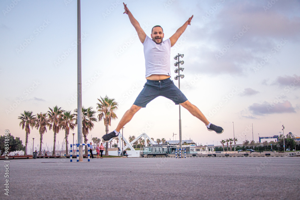 happy man jump at evening