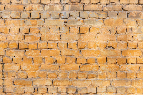 texture of an old yellow brick wall
