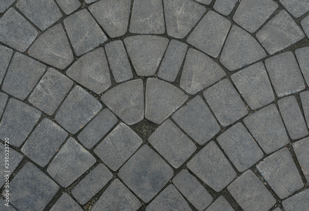 Obraz premium Background. Texture. Stone paved road. Top view close-up