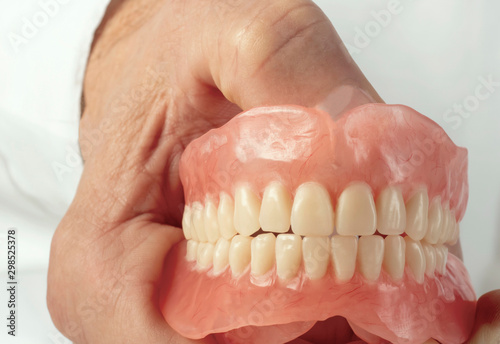 False teeth prosthesis. Doctor Dentist.