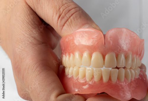 False teeth prosthesis. Doctor Dentist.