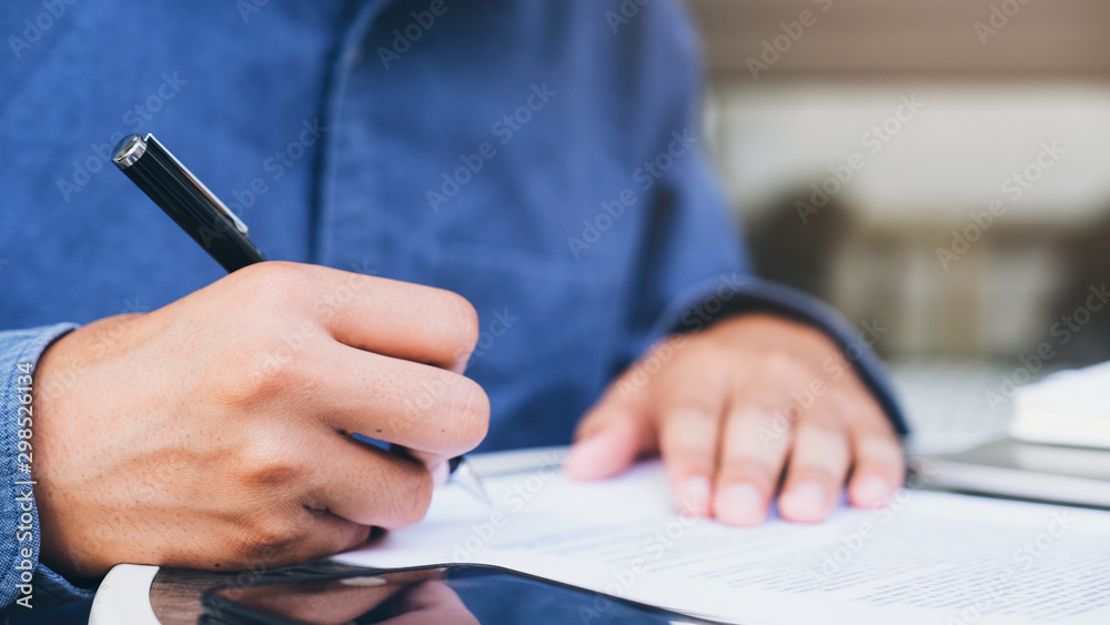 Close up businessman signing contract making a deal. Close up businessman signing contract making a deal.