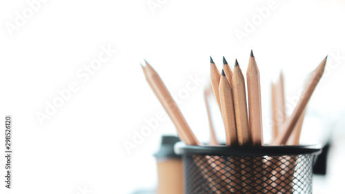 Group of pencils on desktop. photo