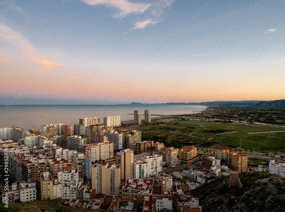  Aerial view of Mediterranean coastal city at sunset, Cullera