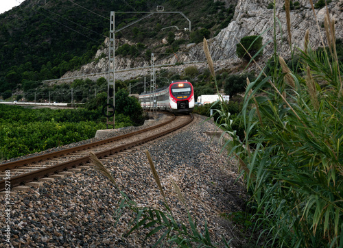 Obraz na plátně train tracks, level crossing and moving rail