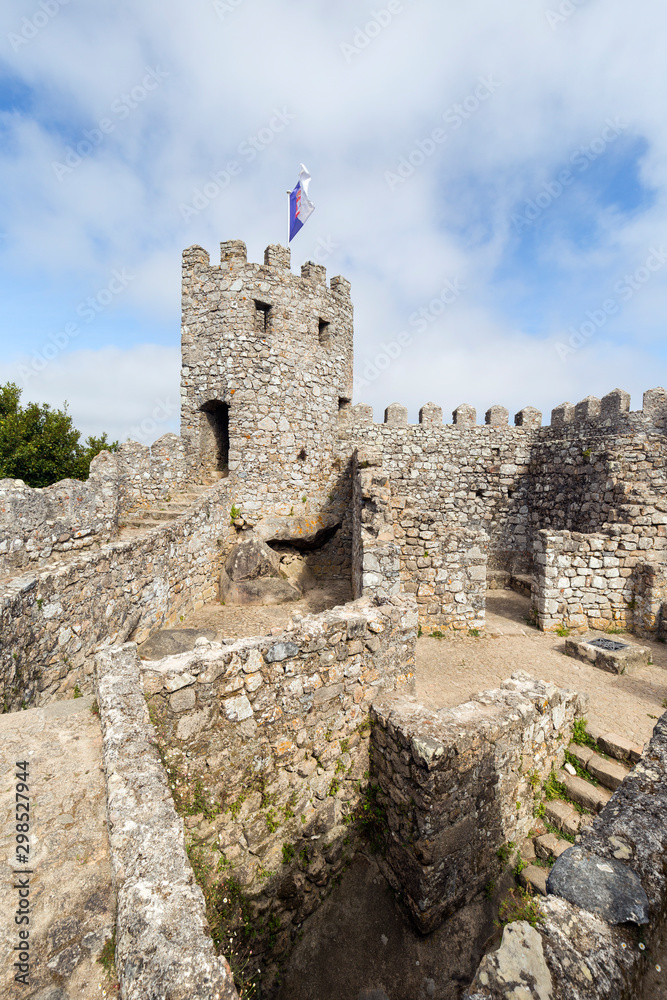 Old ruins of medieval hilltop castle Castelo dos Mouros (The Castle of the Moors) in Sintra, Portugal.