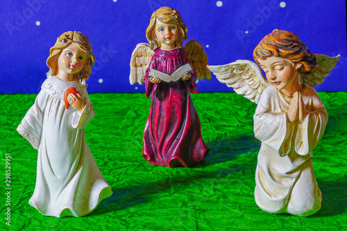 Christmas angels show adoration and worship