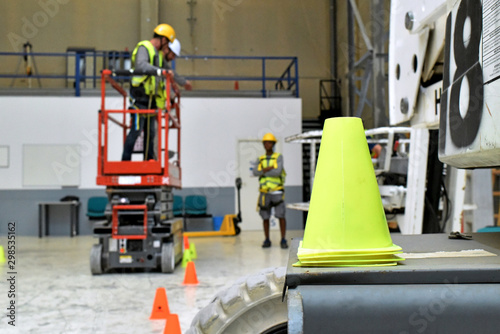 Paterna, Valencia, Spain: 10.18.2019; The yellow traffic cone in the workshop