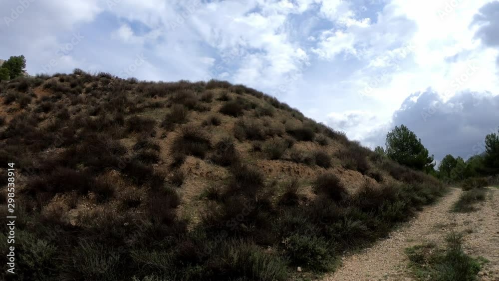 4K POV driving on a mountain way very slowly until arrive a pine forest. A car drives through the mountain on Nerpio's road, Murcia Spain on a cloudy day. 4K POV driving on a mountain way very slowly until arrive a pine forest. A car drives through the mountain on Nerpio's road, Murcia Spain on a cloudy day.
