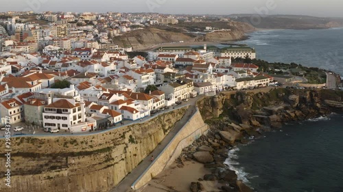 Ericeira village beach and cityscape in Portugal, Europe, 4k aerial drone view