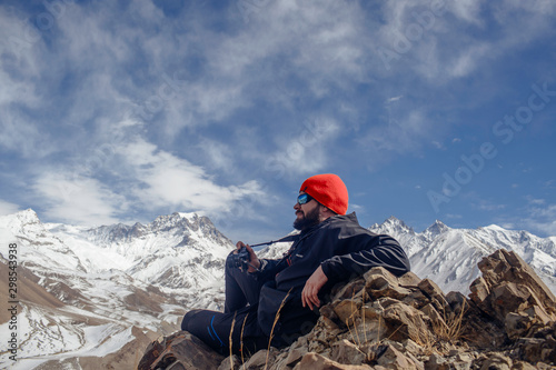 Man meditating at mountains Travel Lifestyle relaxation emotional concept adventure vacations outdoor harmony with nature