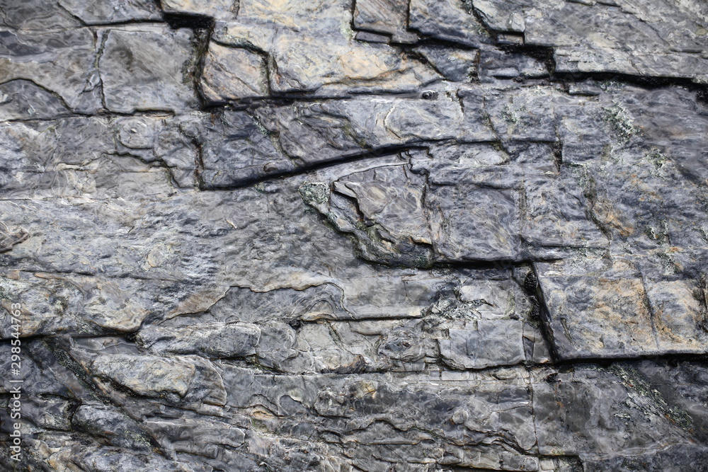 Slate surface with soft reflections of water Slate surface with soft reflections of water