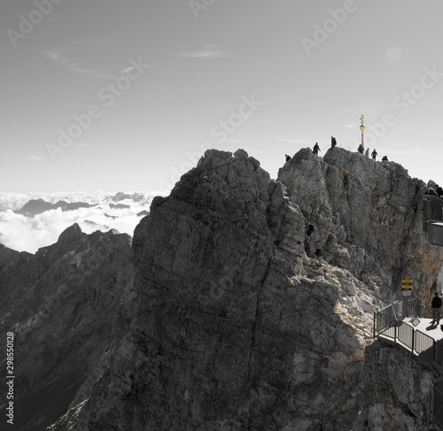 People who have succeed in climbing the mountain, and have reached the top.