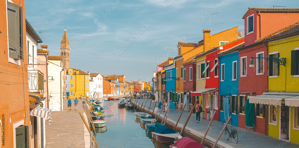 Colourful houses and boats in Murano Italy