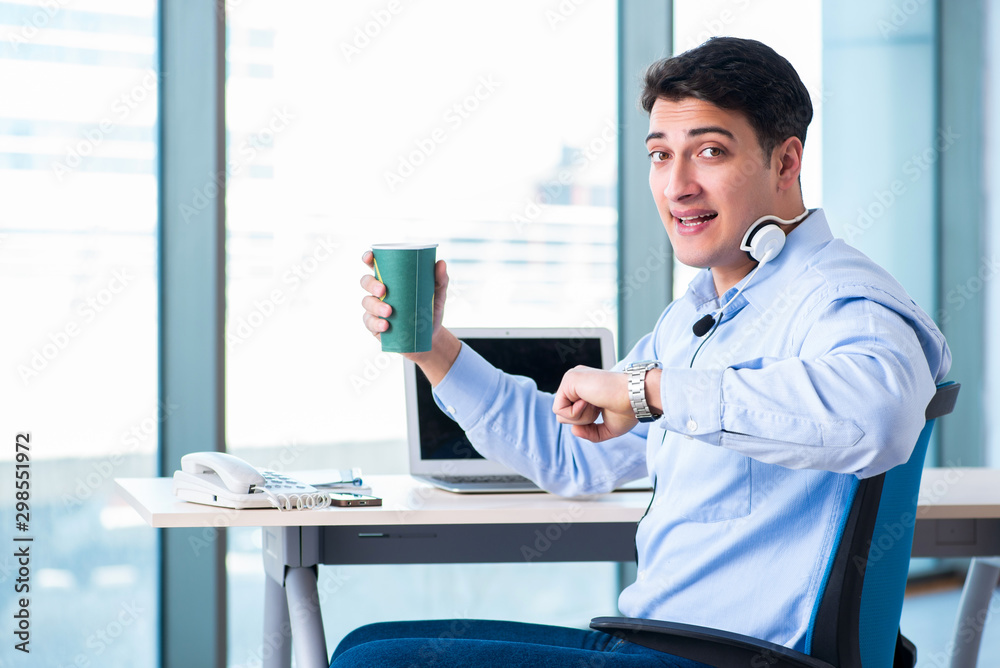 Male call-center operator in business concept Male call-center operator in business concept