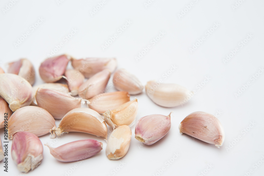 Garlic cloves  on a white background