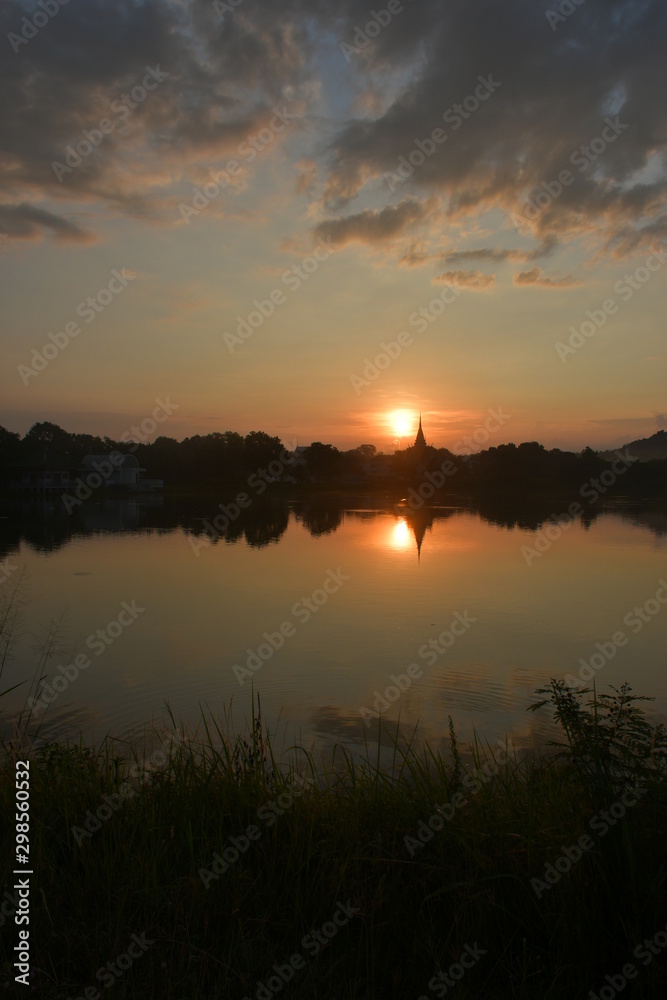 Fototapeta premium sunset over lake