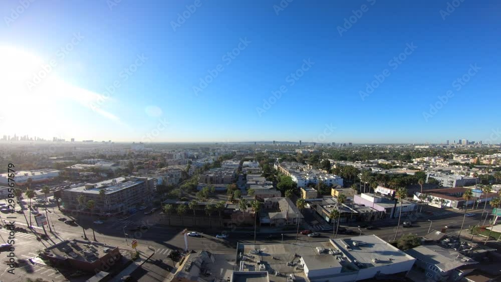 Dolly Right Above Blue Skies & Sunset Boulevard Traffic Facing Downtown Los Angeles & Century City in Hollywood, California 4K Dolly Right Above Blue Skies & Sunset Boulevard Traffic Facing Downtown Los Angeles & Century City in Hollywood, California 4K