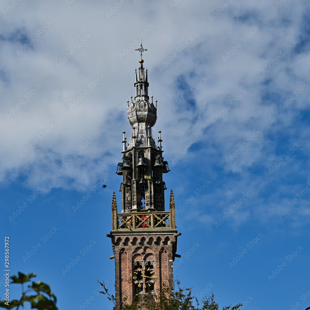 Edam Town Clock Tower Against Cloudy Blue Sky Netherlands