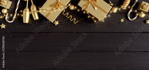 Christmas decorations with gift box on black wooden table background. 3d rendering