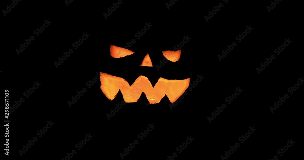 Halloween. All Saints Day. An illuminated carved pumpkin illustrates the atmosphere of this holiday. Halloween. All Saints Day. An illuminated carved pumpkin illustrates the atmosphere of this holiday.